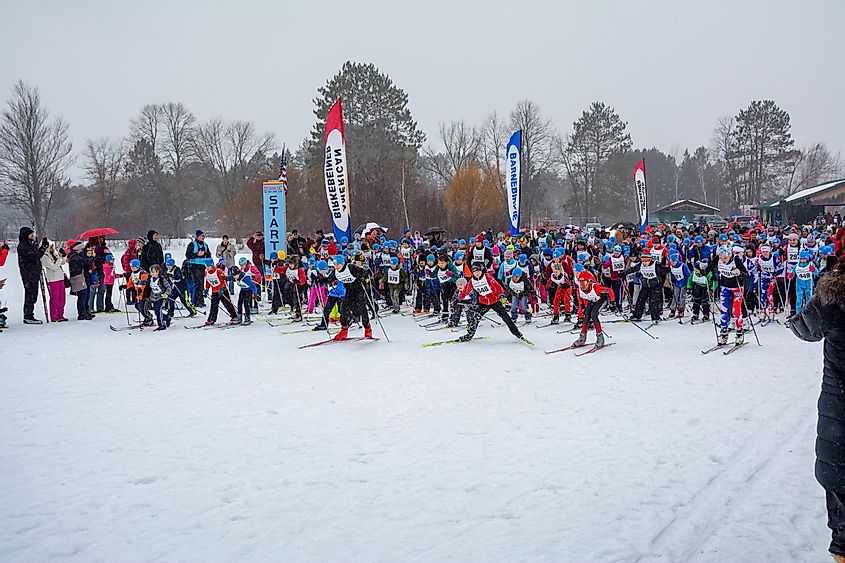 Hundreds of young skiers depart the start line as the Barnebirkie gets underway on Lake Hayward.