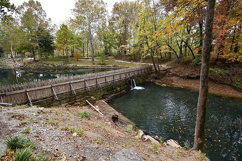 A bridge over water at the Blue Spring Heritage Center in Eureka Springs, Arkansas