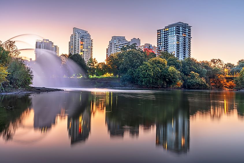 London, Ontario, Canada skyline at dawn on the Thames River.