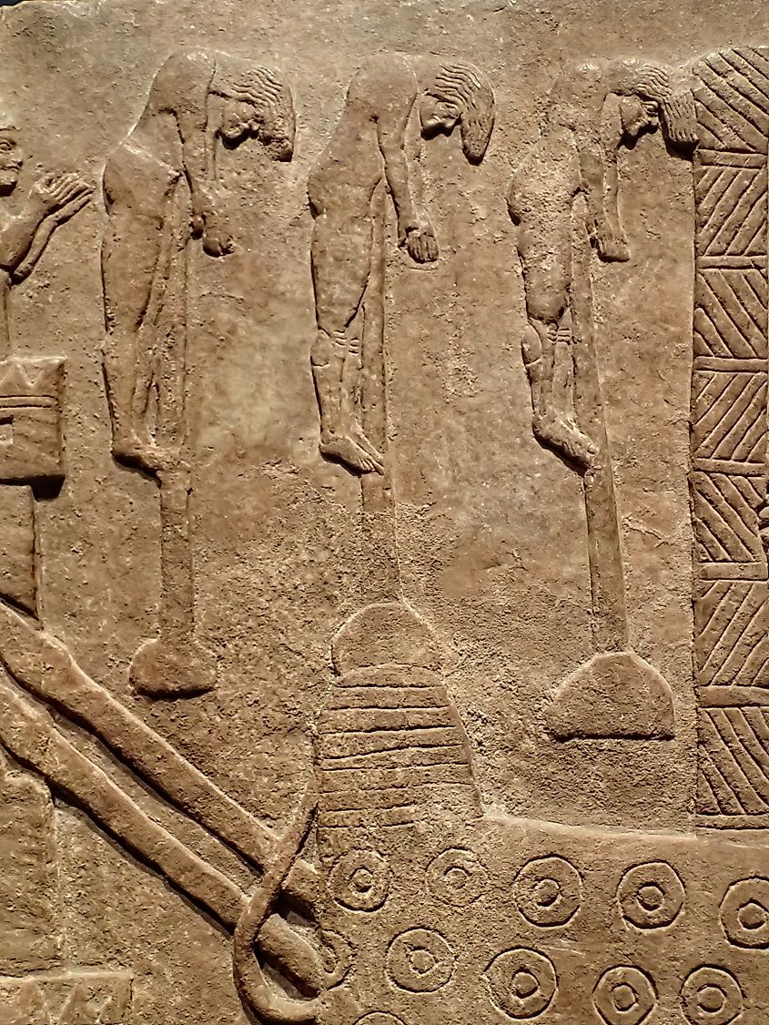Assyrian palace relief of an attack on an enemy town during the reign of Tiglath-Pileser III