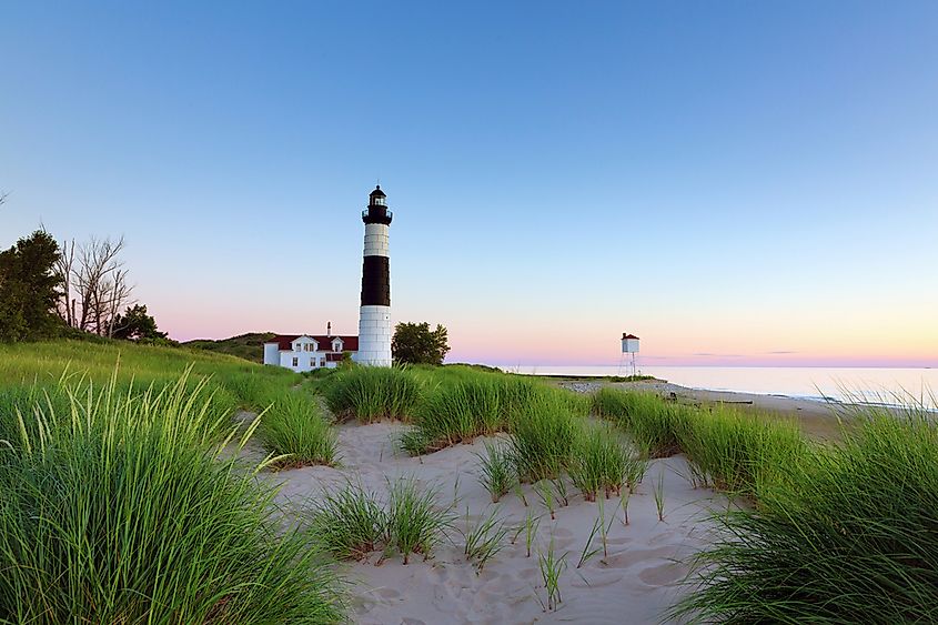 Big Sable Point Lighthouse stands on the Lake Michigan shore in Ludington State Park, north of Ludington, Michigan.