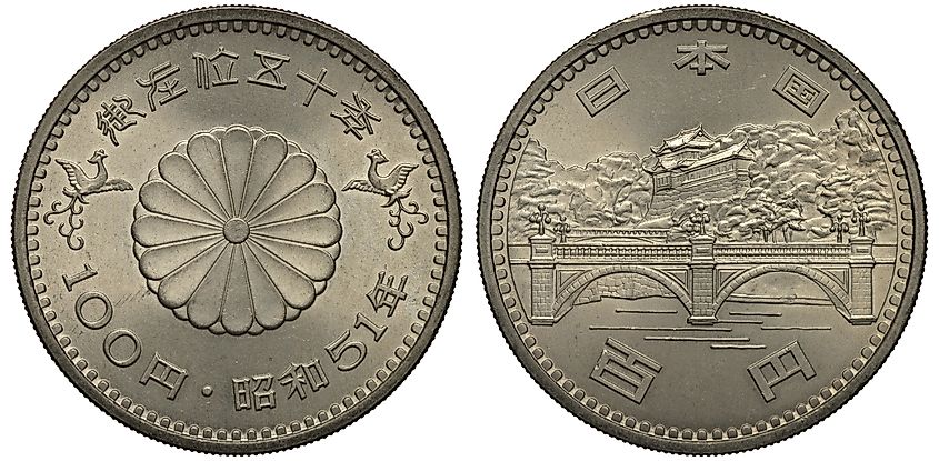 A Japanese coin commemorating the 50th anniversary of the reign of Emperor Hirohito, who ruled Japan throughout the Empire's expansion and the Pacific War.