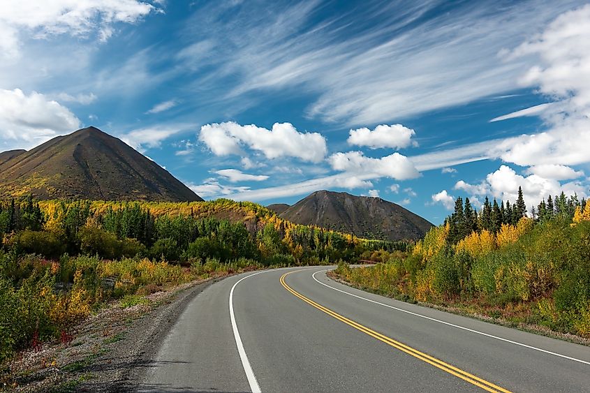 The Alaska Highway passing through the spectacular mountains of Alaska.