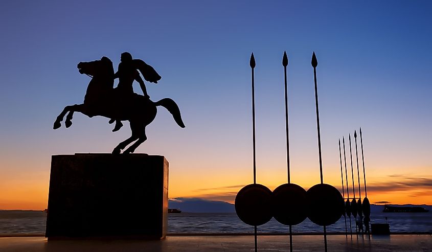 The bronze statue of Alexander the Great on his famous horse with sarissas in the background