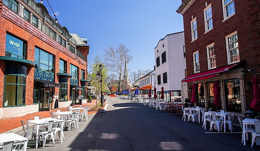 View from Church Lane in beautiful spring day with restaurans table outside