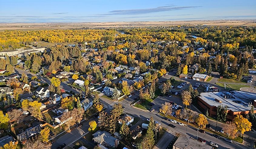 Aerial drone view of the autumn colors in a residential neighborhood in High River, Alberta, Canada.