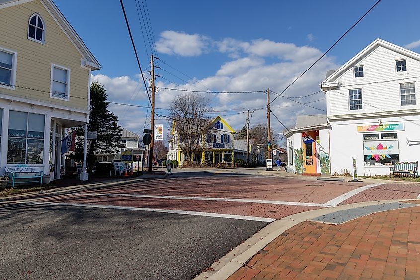 Editorial Photo Credit: blubird via Shutterstock. Stevensville, MD USA - Mar 22, 2025: Stevensville downtown, a picturesque intersection with a variety of shops and businesses