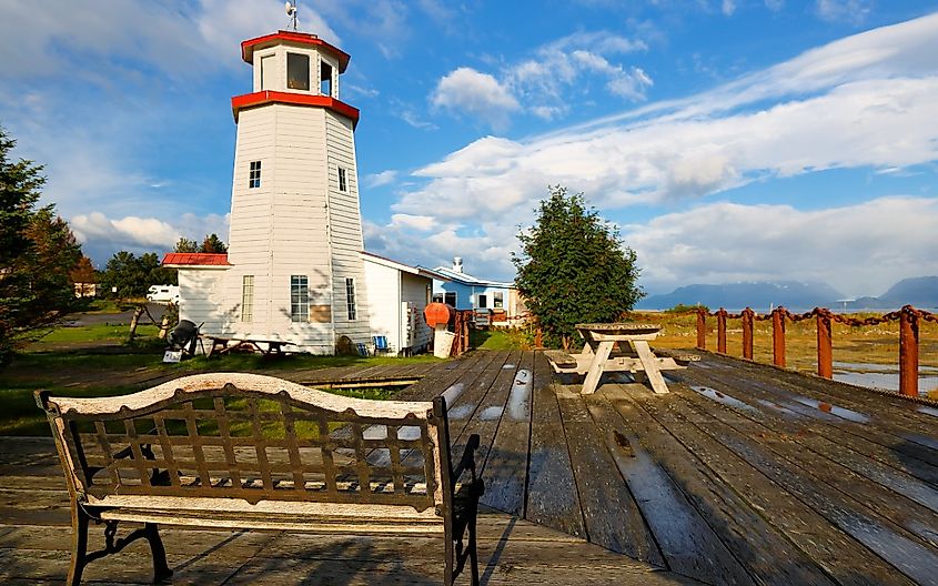 Homer Spit Lighthouse at sunset. Homer is a town on the north side of the entrance to Kachemak Bay from Cook Inlet, south of Anchorage, Alaska