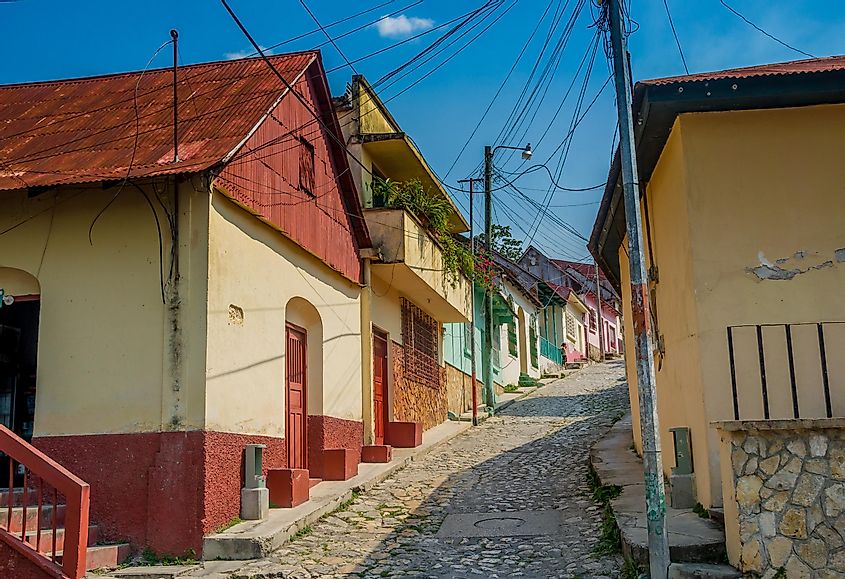 A cobblestone street of a pretty island town