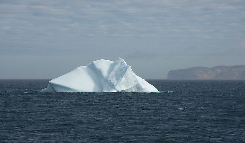 Large iceberg in front of Lower Savage Islands between Frobisher Bay & Hudson Strait, off the tip of Baffin Island. .