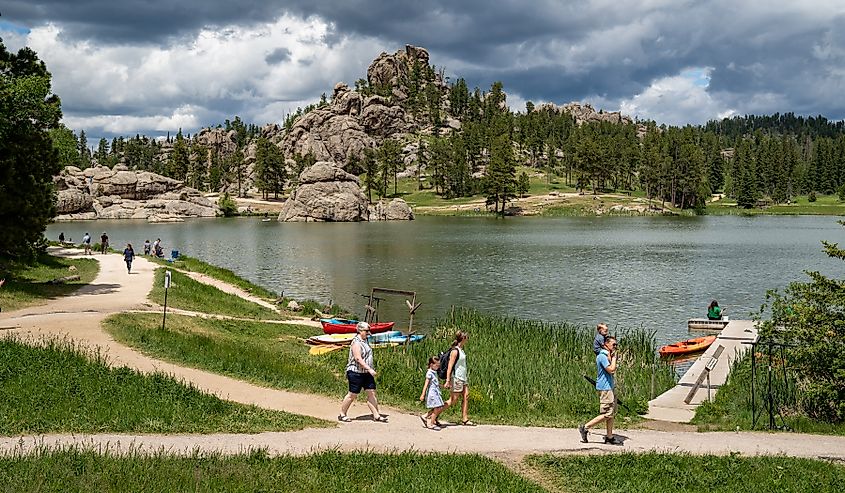 Families enjoy a summer day on Sylvan Lake in Custer State Park, South Dakota.