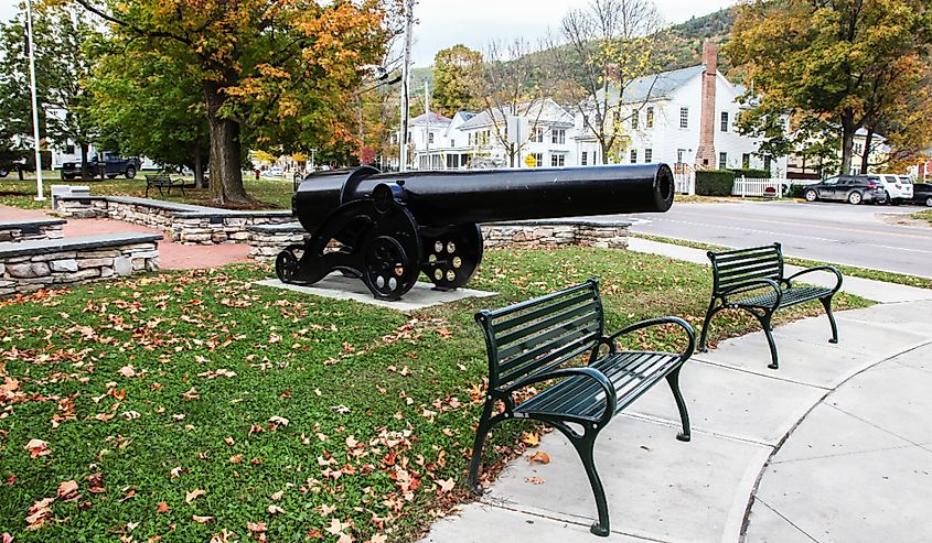 Street view with historical canon from downtown in Bristol, Vermont.