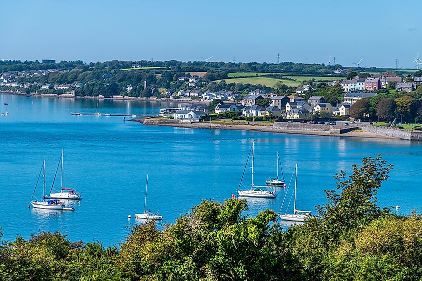 Boats moored in the river estuary at Pembroke Dock, Wales, in summer.