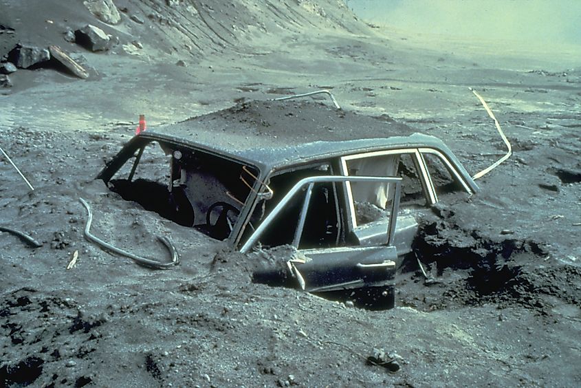 A car buried in volcanic debris following the 1980 eruption of Mount St. Helens.