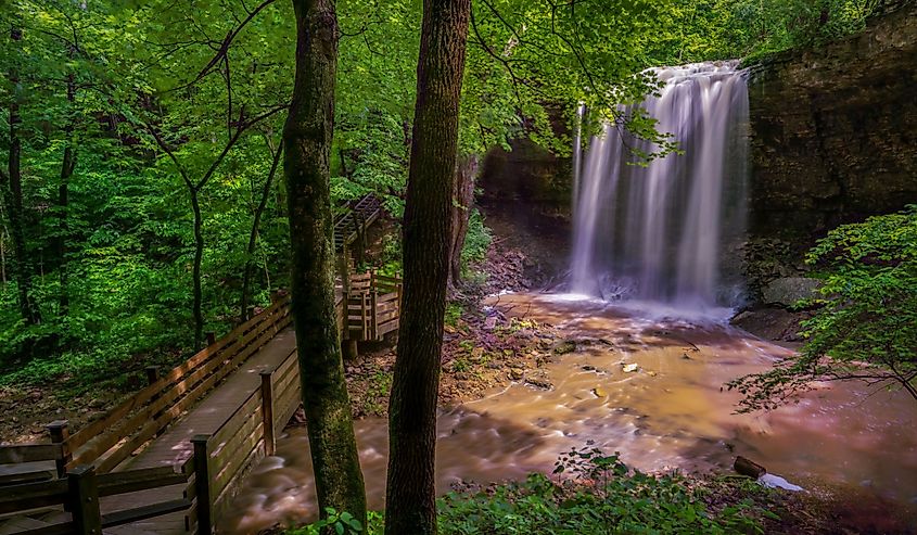 The Falls at Charleston Falls Preserve in Tipp City Ohio with lush summer foliage.