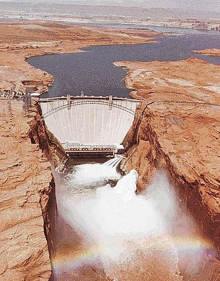 Glen Canyon Dam releasing floodwater in 1984, testing repairs of the spillways which were heavily damaged in 1983.