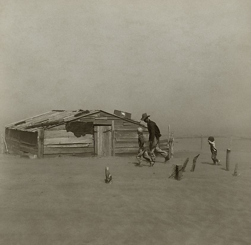 Arthur Rothstein's Farmer and Sons Walking in the Face of a Dust Storm, a Resettlement Administration photograph taken in Cimarron County, Oklahoma, in April 1936