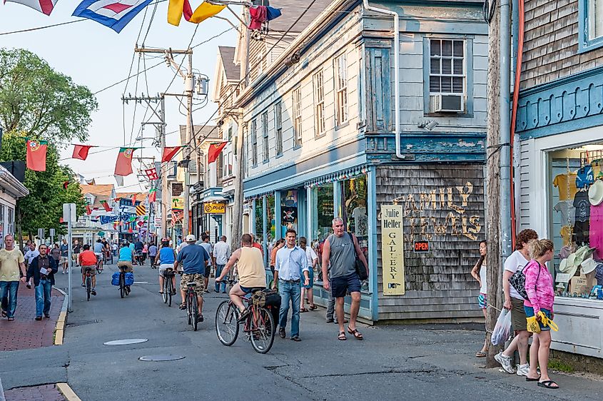 PROVINCETOWN, MA, USA - 19 JUNE 2010: Commercial Street is the main street for food and entertainment in Provincetown. Cape Cod is a popular travel destination in Massachusetts. Rolf_52 via Shutterstock