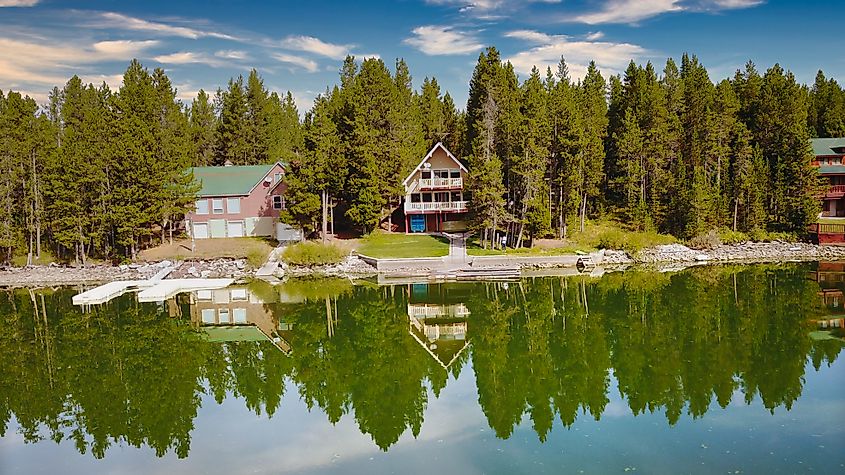 Cabins along the river at Island Park, Idaho.