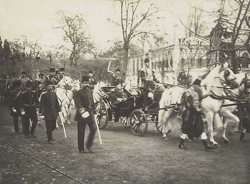 Ottoman Sultan Mehmed V in a carriage followed by the Young Turk Enver Pasha by Everett Collection via Shutterstock.com