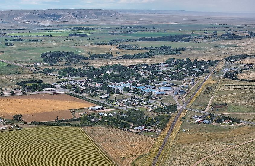 Aerial view of La Grange, Wyoming, showing a small rural town surrounded by open fields and farmland