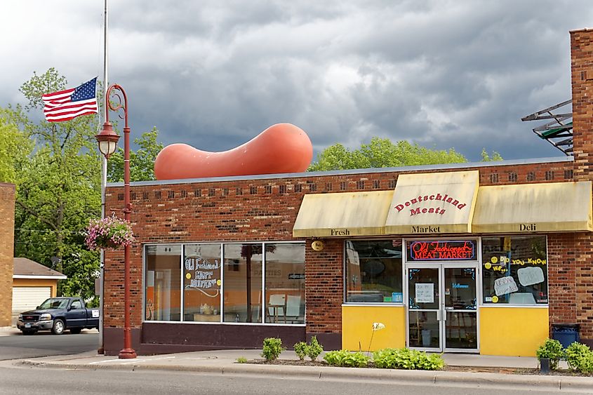 A giant link of meat sits atop the roof of Deutschland Meats in Lindstrom, Minnesota.