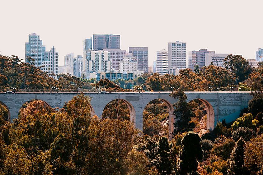 Fall in the city of San Diego - view of the bridge with Balboa Park and autumn foliage