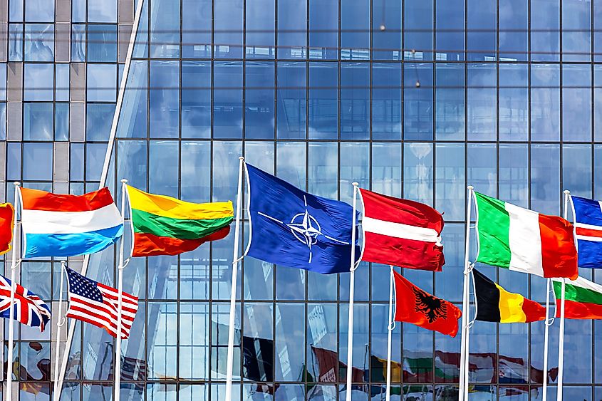 NATO flag flying in front of NATO headquarters in Brussels, Belgium.