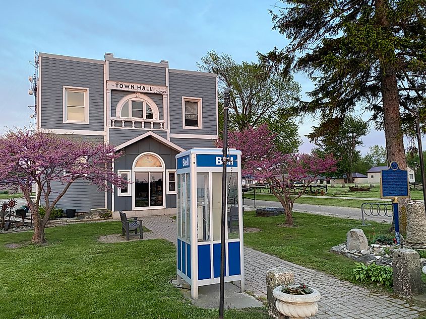 A blue siding building that once acted as Pelee Island's Town Hall. A Bell phone booth still operates on the front lawn.
