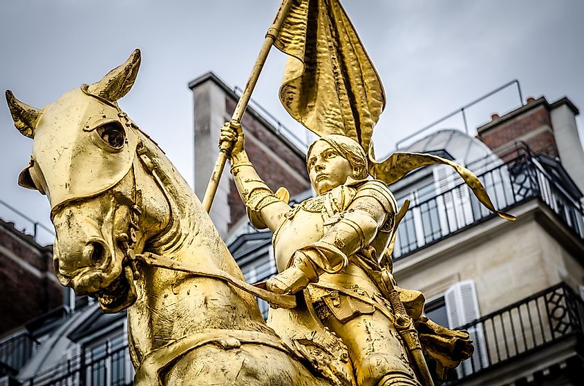 The golden statue of Saint Joan of Arc on the Rue de Rivoli in Paris, France. sculpted by Emmanuel Fremiet in 1864.