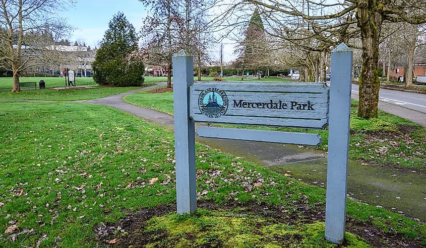 Downtown Mercer Island, Mercerdale Park sign with green space in background