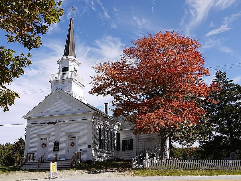 Church or chapel in Brooksville, Maine, USA, with fall foliage