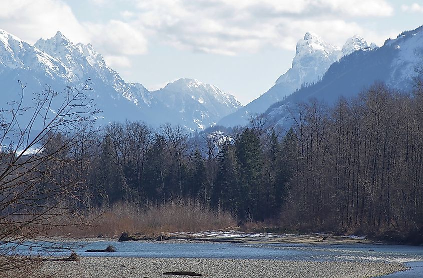 Skykomish River and peaks of the Cascades just off US Highway 2 in Sultan, Washington.
