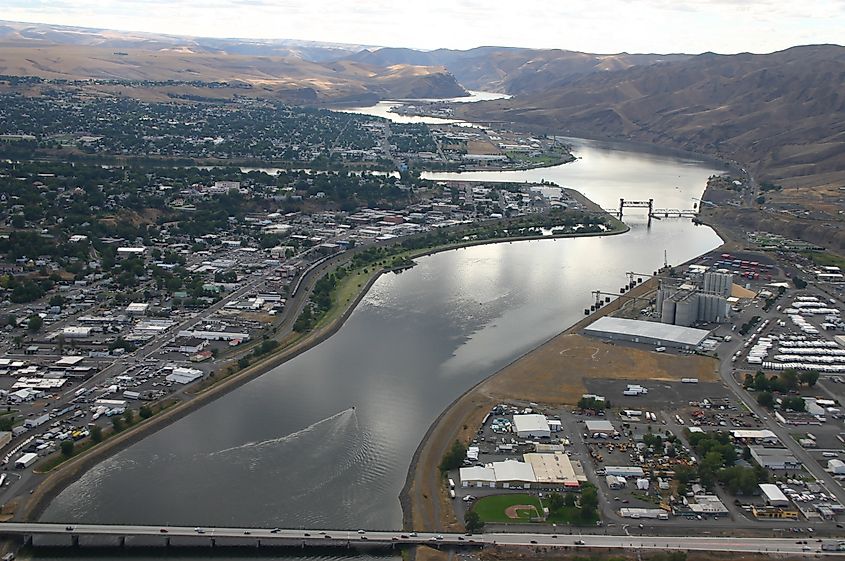 aerial drone photo of the lewiston Clarkston Valley featuring the confluence of the Clearwater and Snake Rivers and the commercial port districts along the rivers