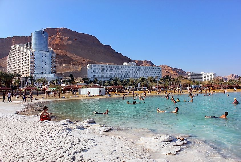 tourists in the Dead Sea