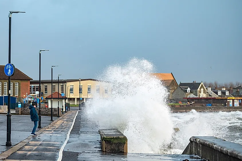 Waves come over the Troon promenade (Editorial credit: Euan Cherry / Shutterstock.com)