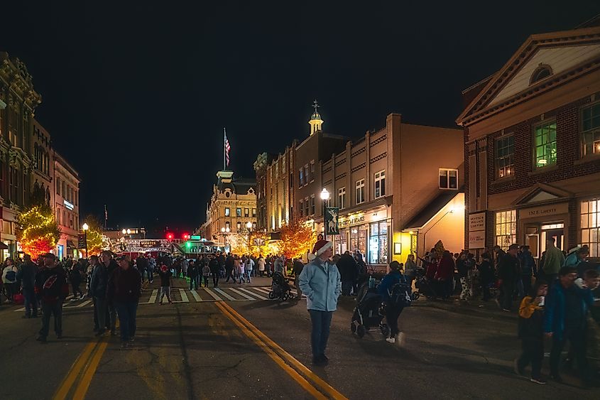 Festive crowds gather on a street in Wooster, Ohio