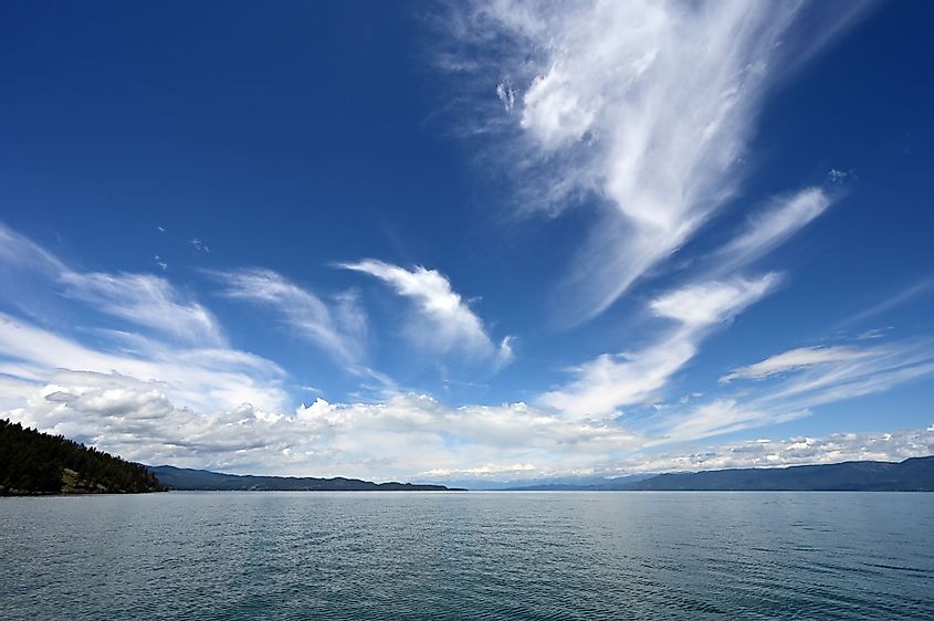 Beautiful dramatic summer cloudscape over Flathead Lake in Montana on a calm June day