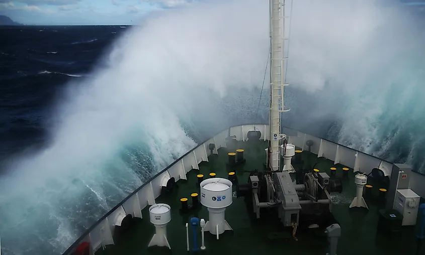 A ship in the face of a massive rogue wave.