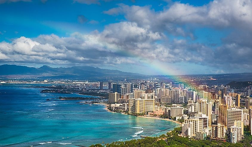 Rainbow over Honolulu skyline and city. 