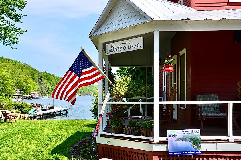 American home proudly displaying the national flag in Dundee, New York.
