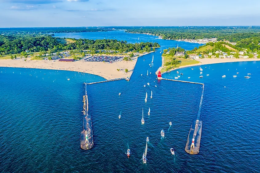 Aerial view of the Holland Harbor Lighthouse, known as the Big Red Lighthouse