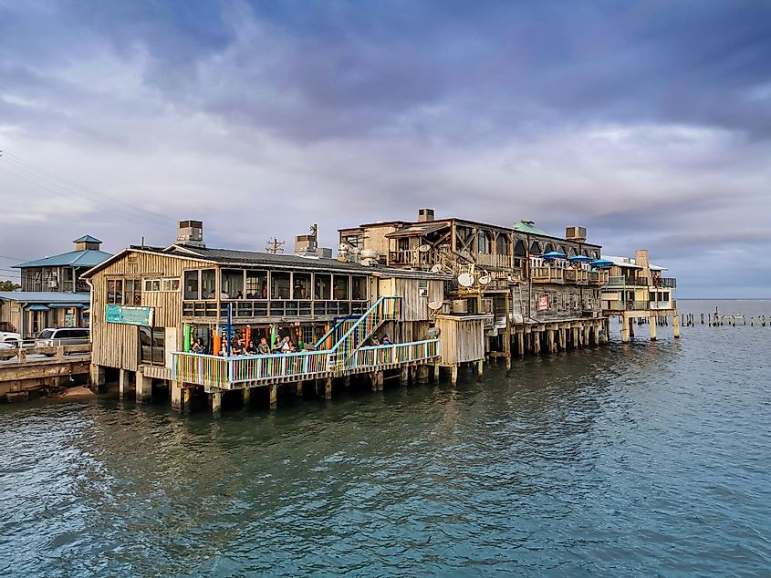 Cedar Key, Florida / United States, December 28th 2019: Waterfront buildings on stilts in Cedar Key tourist town, Gulf of Mexico. 