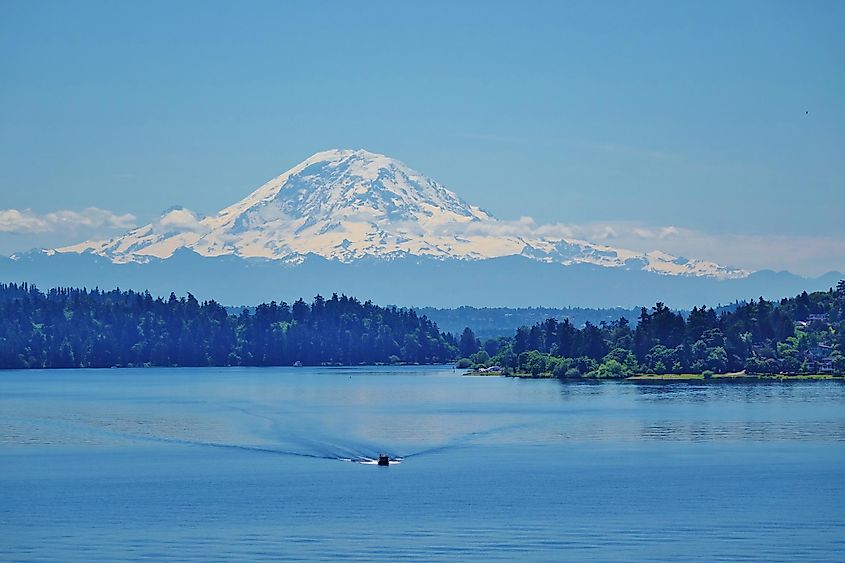 Mount Rainier, 90 miles away, rises above Lake Washington in Seattle