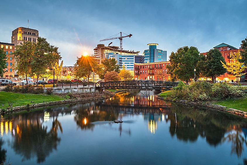 Kalamazoo, Michigan, USA downtown cityscape and park at dusk.