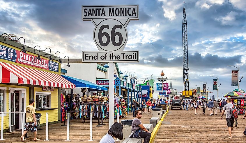 General view of the Santa Monica Pier with the sign end of Route 66 on Venice Beach, Los Angeles, California