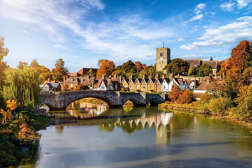 Panoramic view of Aylesford village in Kent, England, with the medieval bridge over the River Medway in autumn