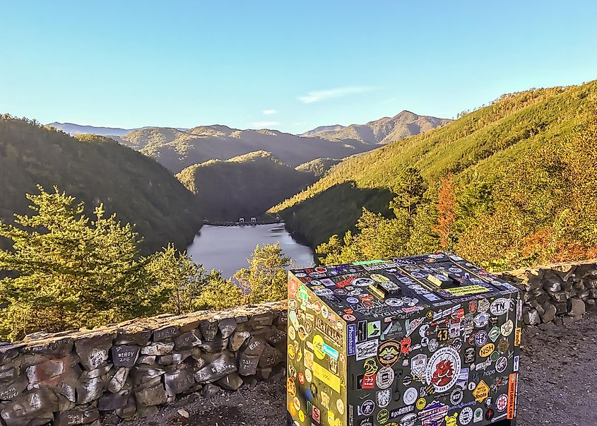 Tail of the Dragon lookout with bumper stickers and graffiti, Calderwood Lake and Dam, Route 129, North Carolina, USA.