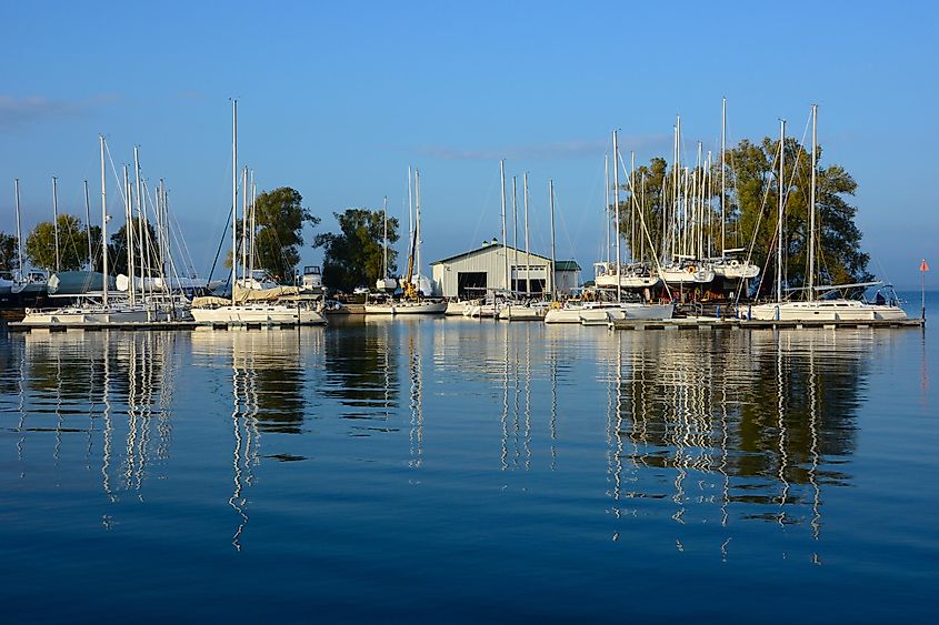 Scenic view of the marina at Sackets Harbor in New York state, under a clear blue sky.