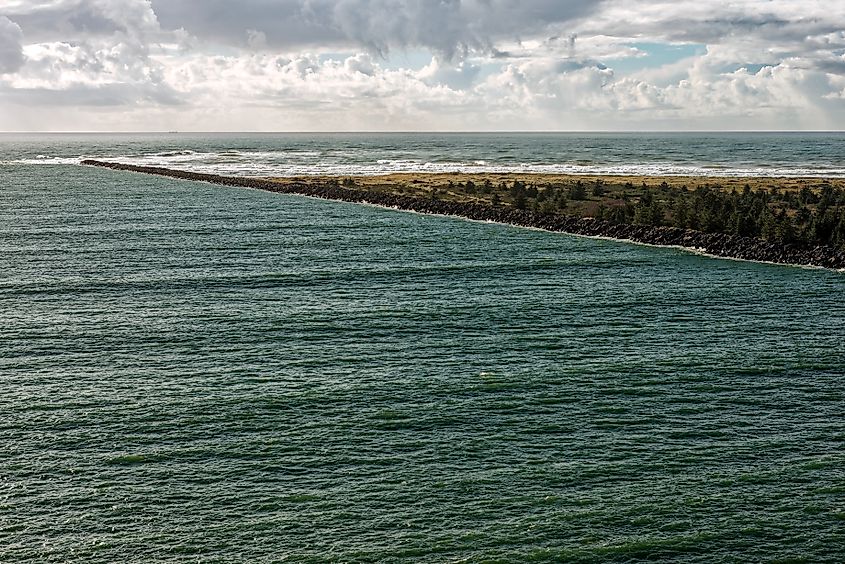 The Columbia River meets the Pacific Ocean.